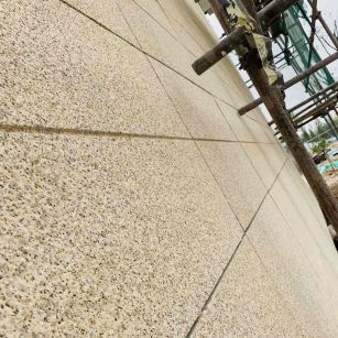 辽阳 黄金麻花岗岩荔枝面外墙干挂石材效果示例