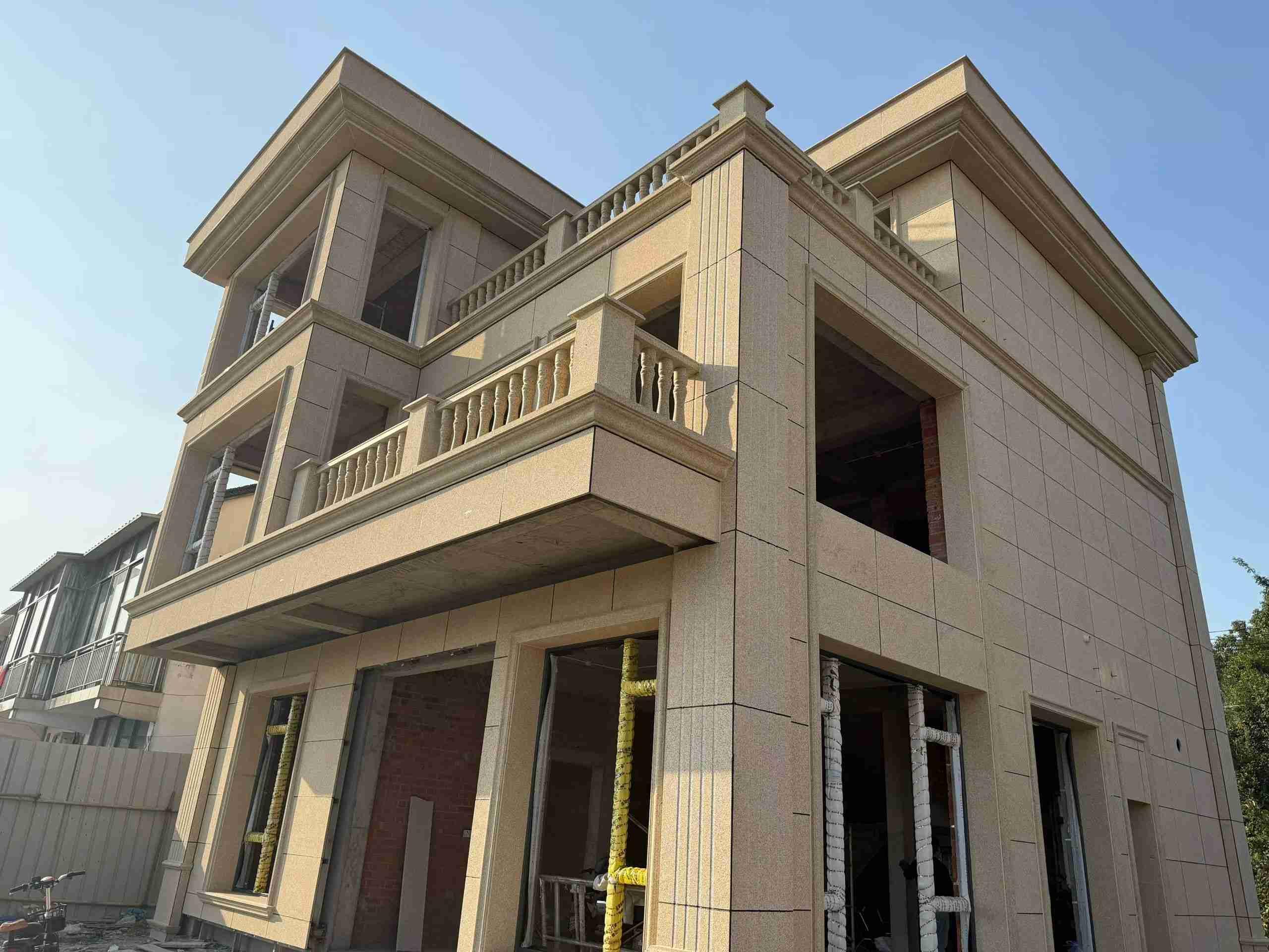 辽阳 黄金麻花岗岩石材荔枝面外墙干挂效果展示