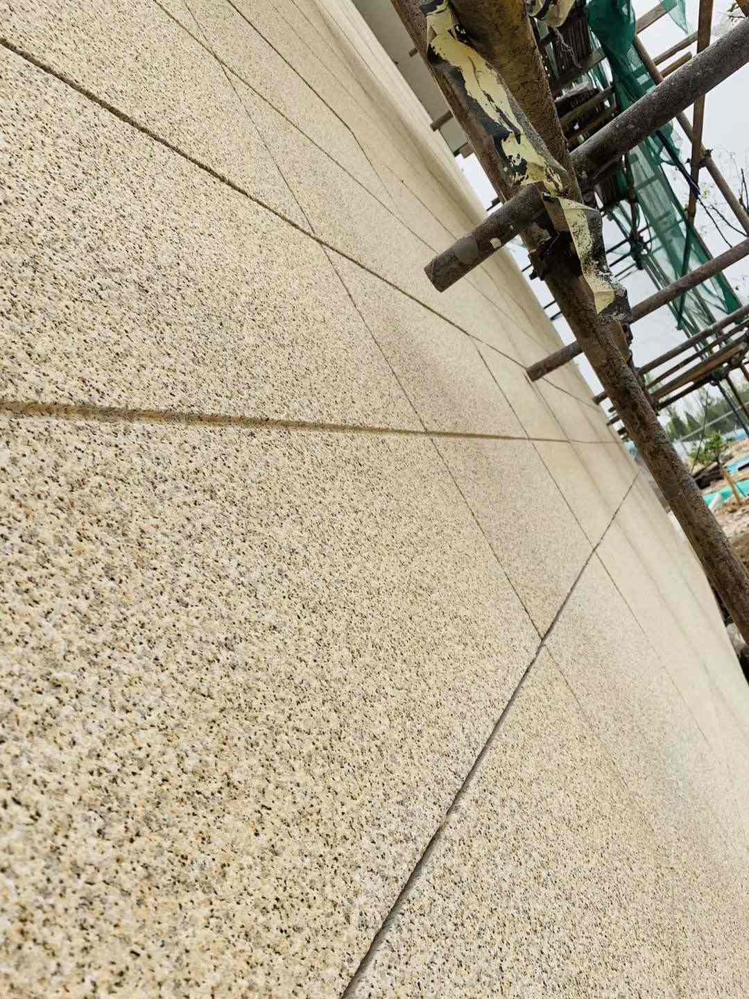 辽阳 黄金麻花岗岩荔枝面外墙干挂石材效果示例